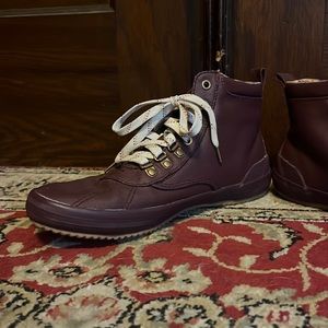 Ked’s plum colored high top shoes. Size 8.5. Barely worn.